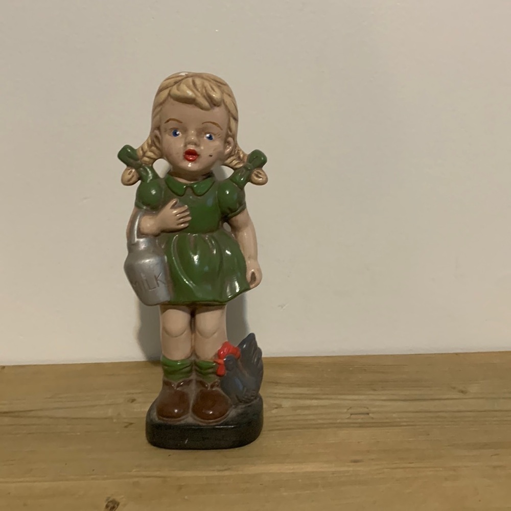 Vintage 1992 Hummel figurine holding a milk bucket